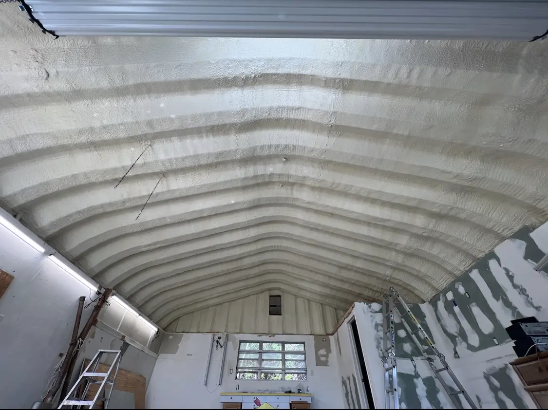 Spray polyurethane foam applied to the underside of a metal roof deck in Piscataway