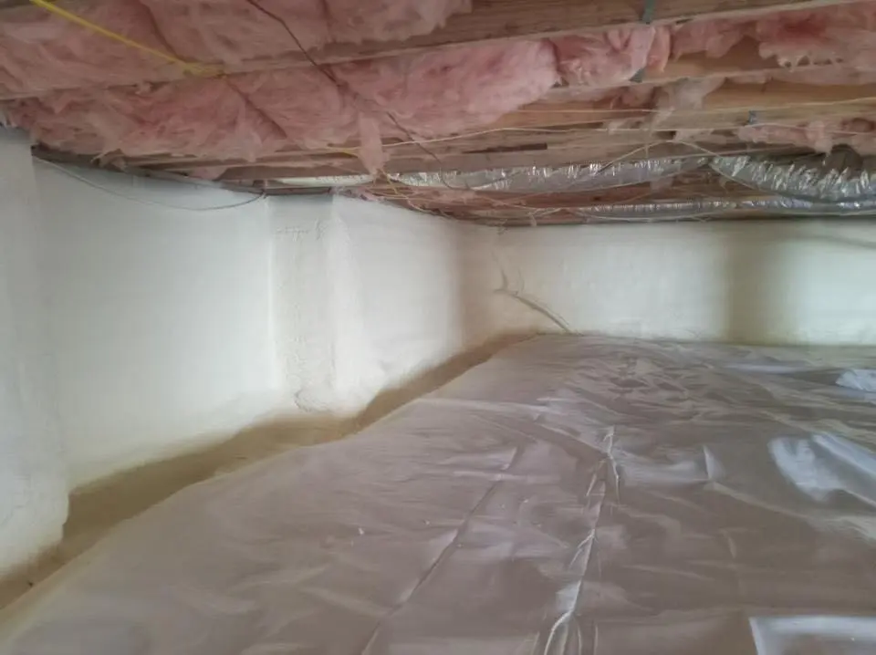 Crawl space encapsulation with closed-cell spray foam for Storm Damage Roof Repair in Piscataway